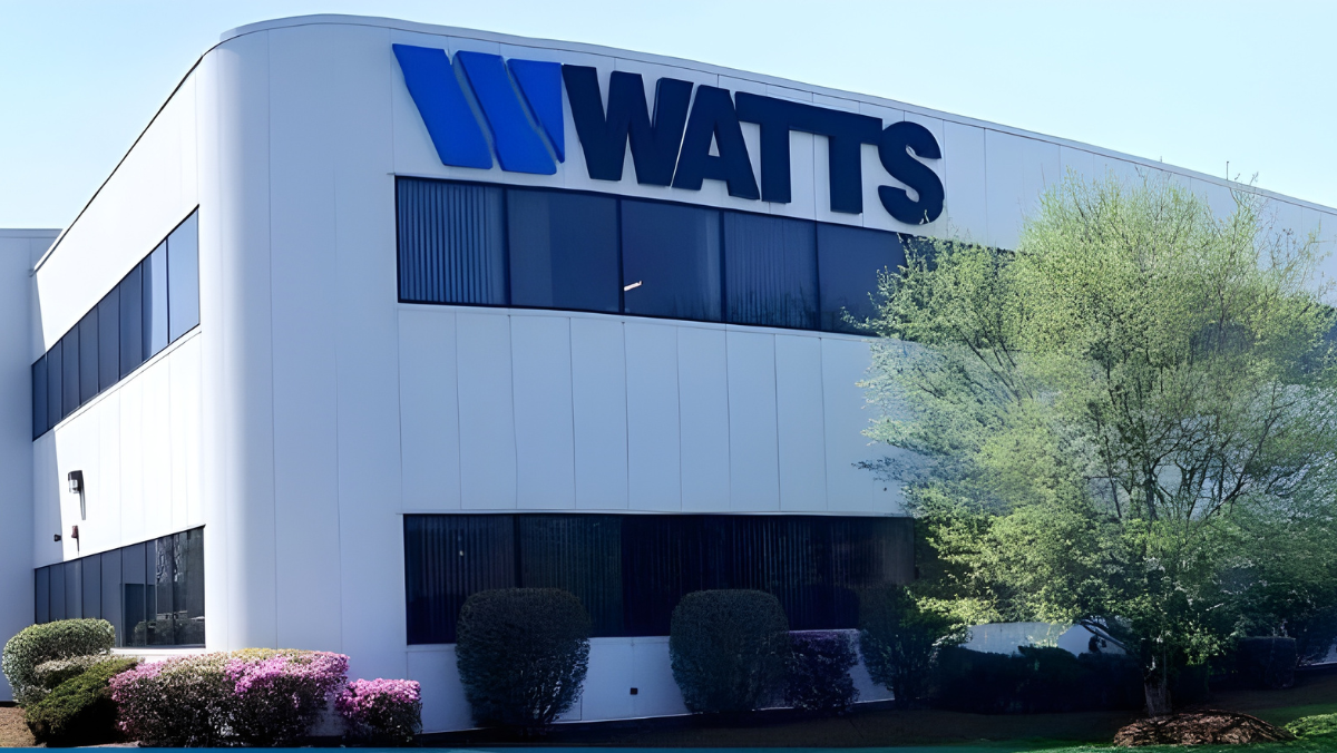 Watts Water Technologies building with large Watts logo on exterior